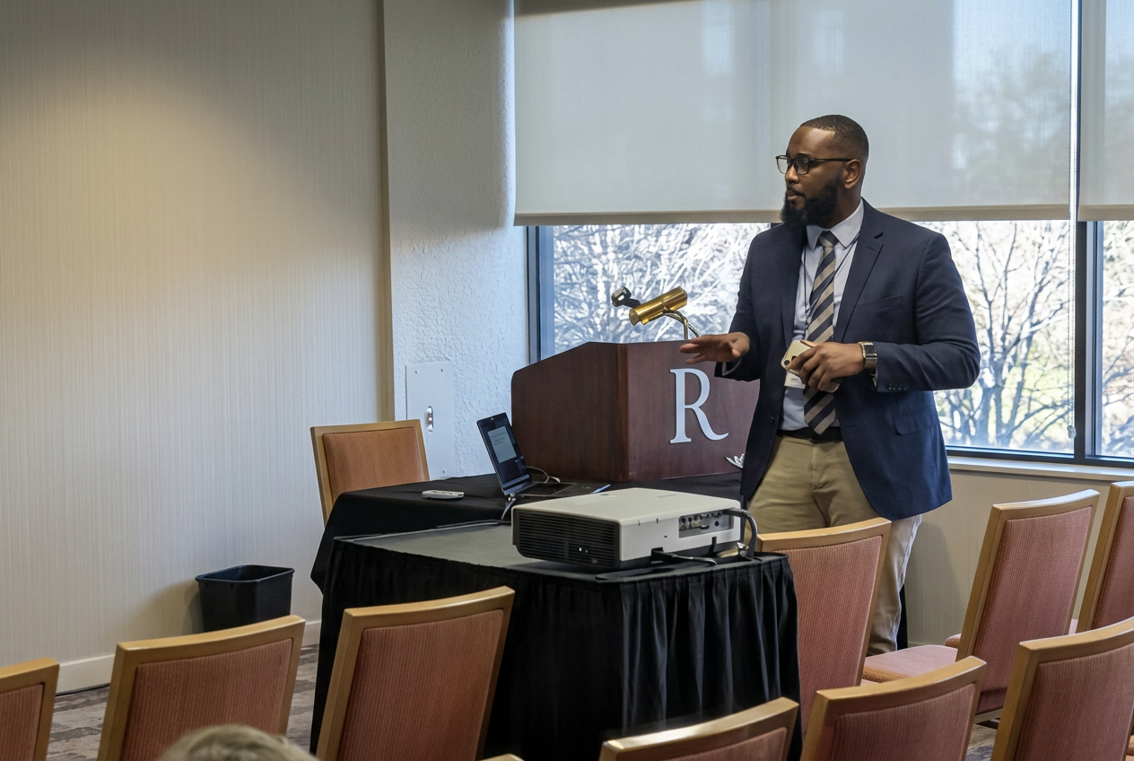 Dr. Marquis Mason presenting research on Black male teacher experiences at a national conference.